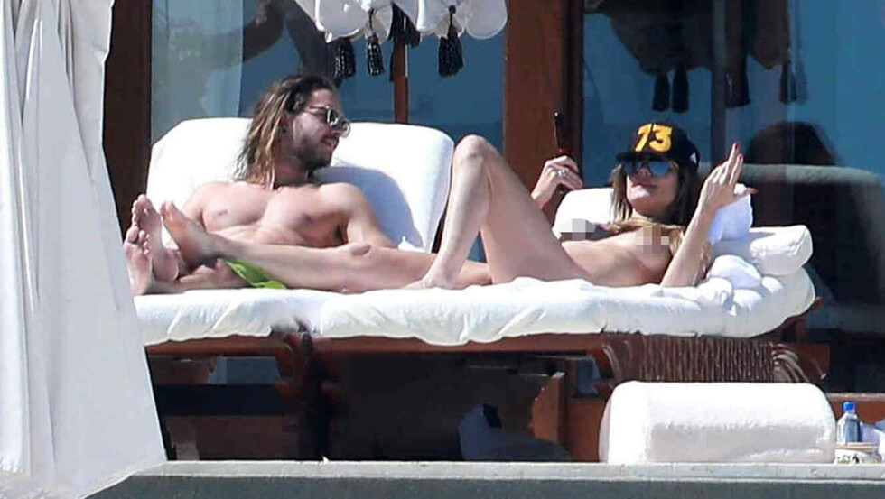Captan a Heidi Klum en topless a sus 44 años