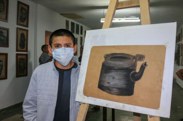 Durante el acto se realizó demostraciones de arte en vivo.