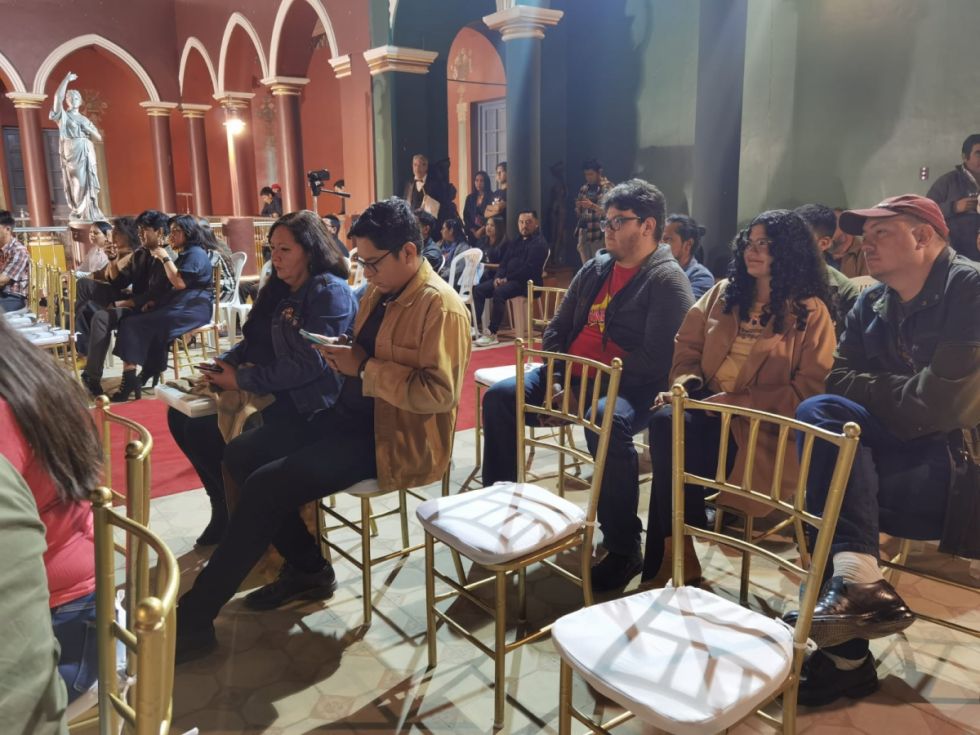 Público en la subasta
