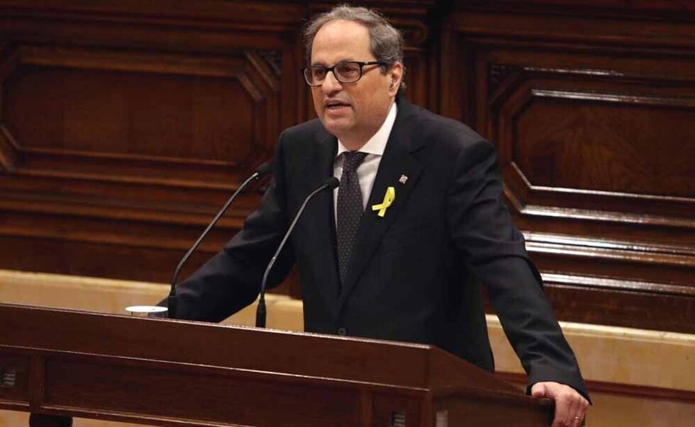 Torra nombra consejeros a 2 presos  y 2 fugados