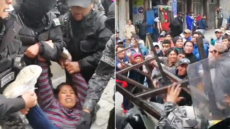 Policía echa por la fuerza a desocupados de plaza Murillo