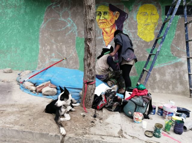 Artistas trabajan murales en el barrio 3 de Mayo 